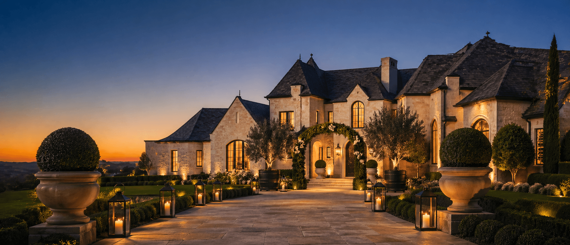 An estate facade with wreathed gables and architectural florals